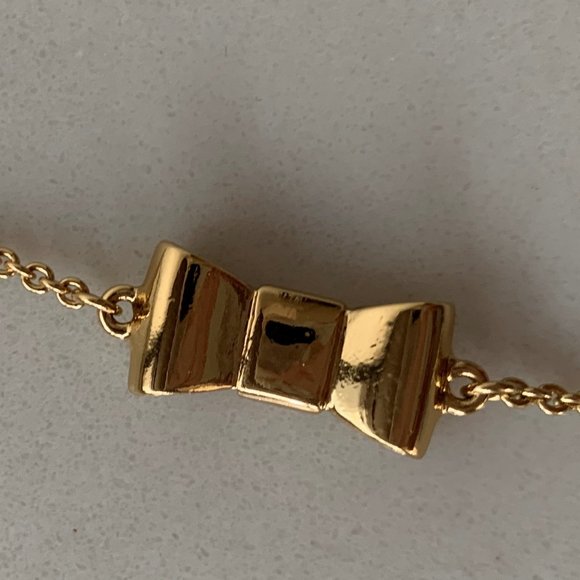 Kate Spade "Take a Bow" gold necklace - Picture 3 of 7